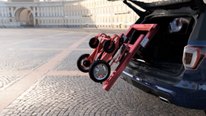 The final rendering of the chair being lifted into the car.